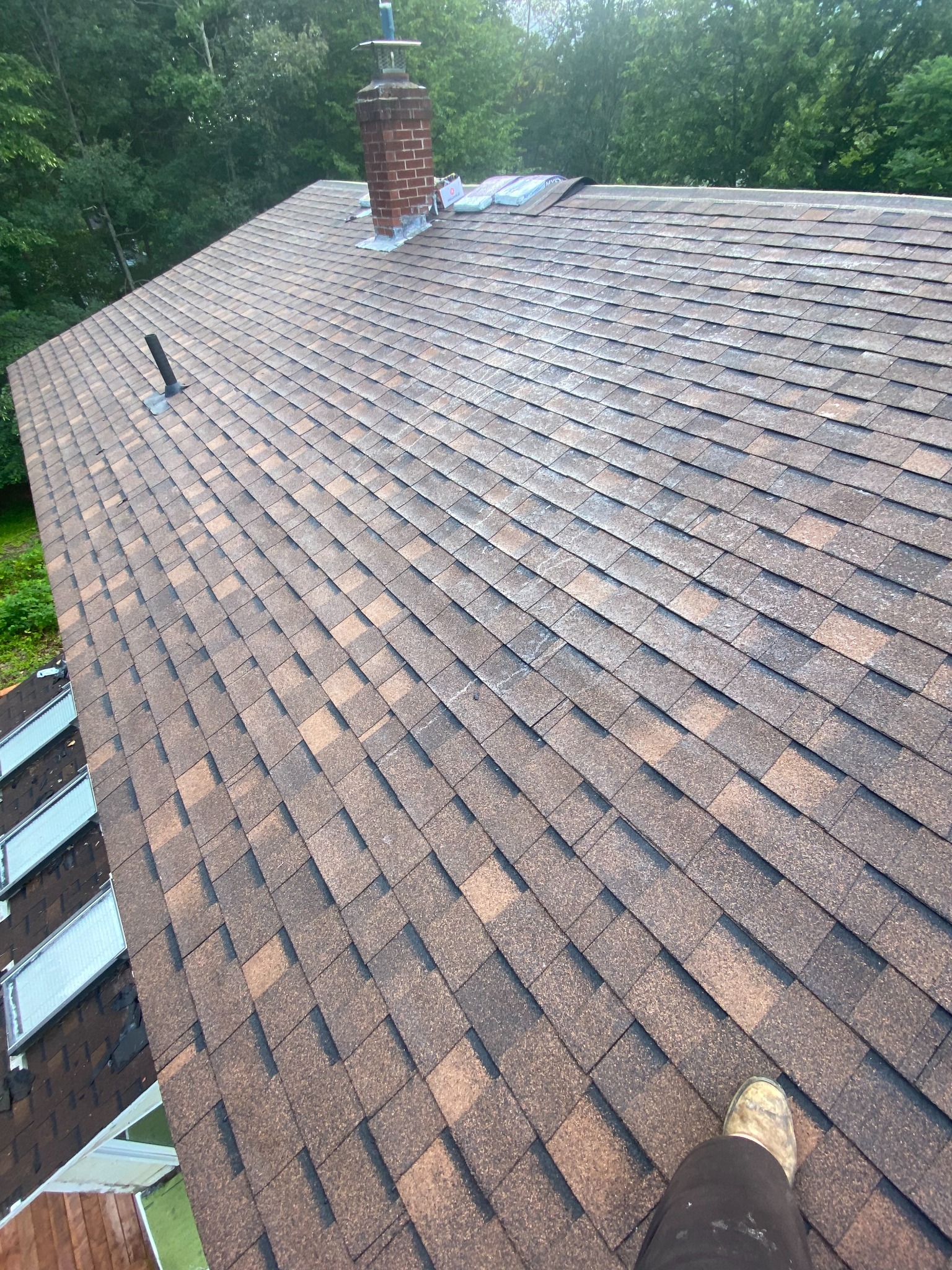 Shingle roof installation from a Stronghold project
